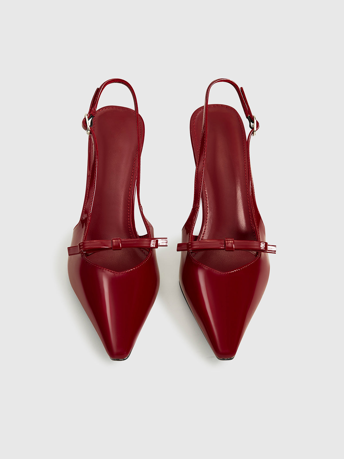 Fiyonklu Sivri Burunlu Arkası Açık Topuklu Ayakkabı