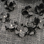 Nadège sahte çiçek detaylı kolsuz mini elbise